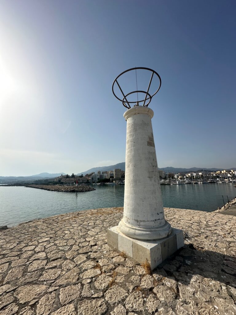 Hand-painted penguin stone #1185 hidden at Espigon del Puerto de Estepona, Estepona, Spain (photo 4 of 4)