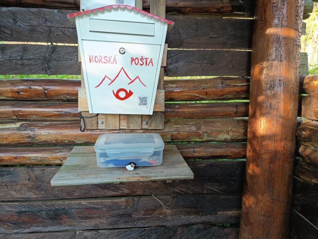 Hand-painted penguin stone #1254 hidden at Horská pošta (Mountain Mailbox), Zlatá Idka, Slovakia (photo 2 of 5)