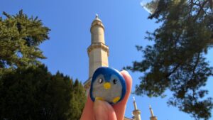 Hand-painted penguin stone #1383 hidden at Lednice Minaret, Lednice, Czechia