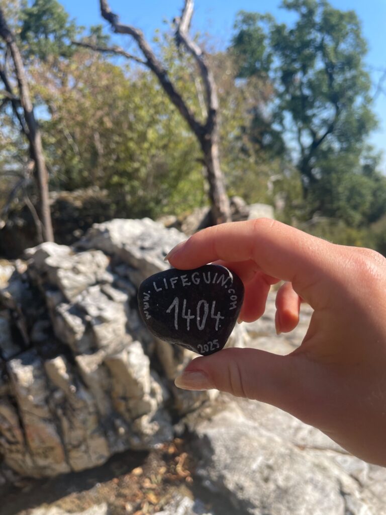Hand-painted penguin stone #1404 hidden at Underneath Rocks, Little Carpathians, Slovakia (photo 2 of 4)