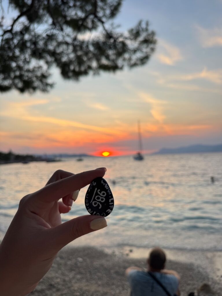 Hand-painted penguin stone #986 hidden at Rocks, Makarska, Croatia (photo 4 of 5)