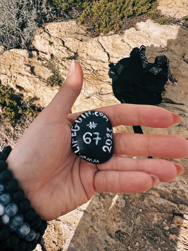 Hand-painted penguin stone #67 hidden at Dwerja Bay, Gozo, Malta (photo 4 of 5)