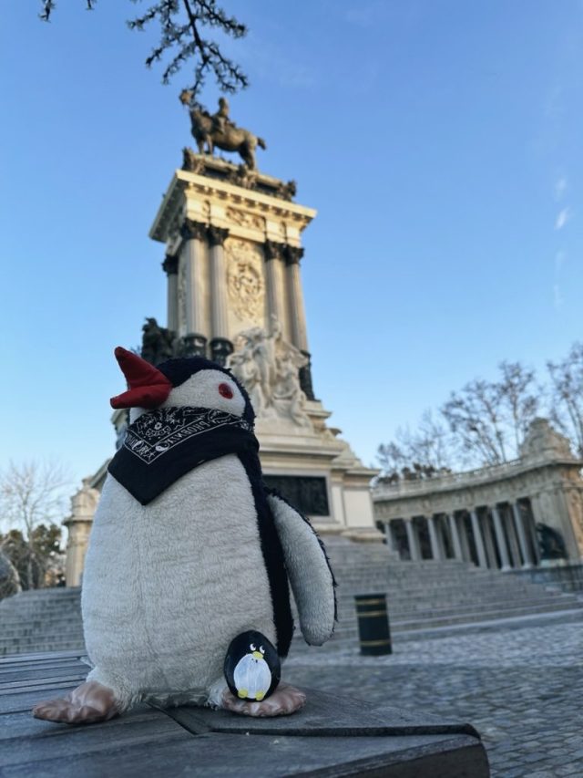 Hand-painted penguin stone #72 hidden at Monument to Alfonso XII, Madrid, Spain (photo 2 of 5)