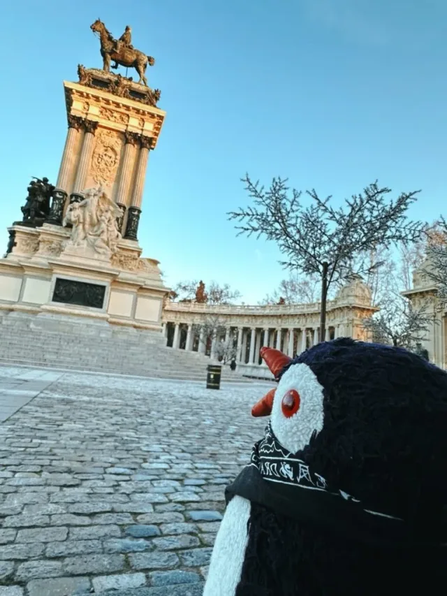 Hand-painted penguin stone #72 hidden at Monument to Alfonso XII, Madrid, Spain (photo 5 of 5)