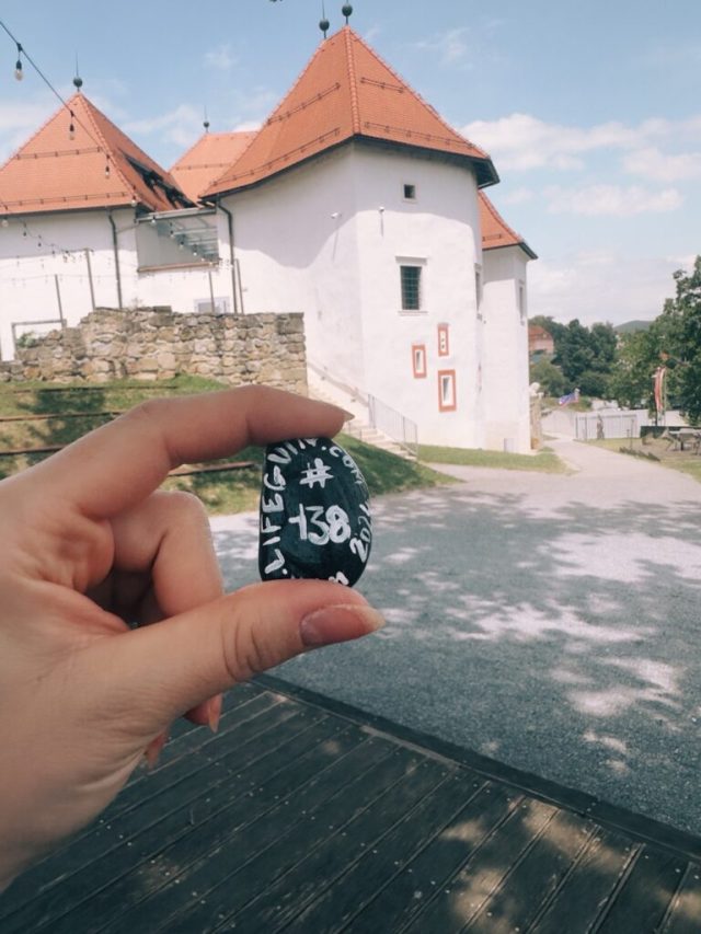 Hand-painted penguin stone #138 hidden at Komenda Castle, Polzela, Slovenia (photo 2 of 5)