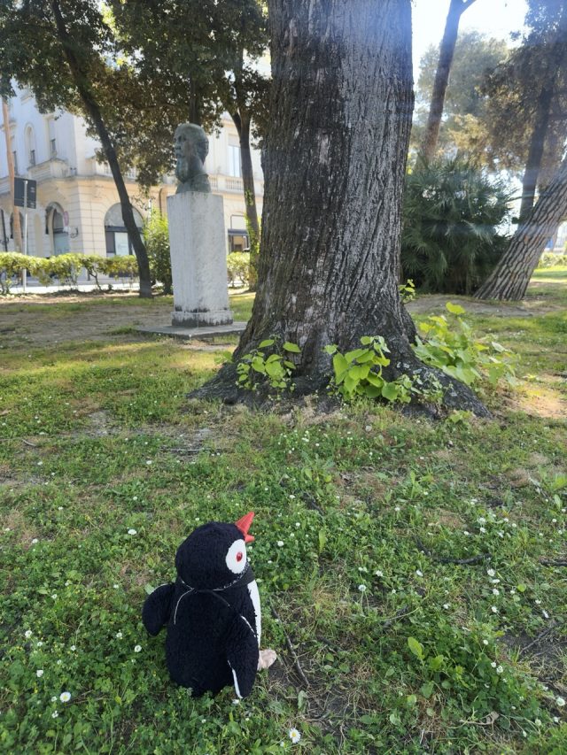 Hand-painted penguin stone #264 hidden at Parco Federico Fellini, Rimini, Italy (photo 4 of 5)