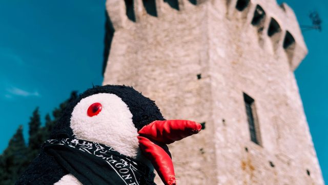 Hand-painted penguin stone #267 hidden at Montale Tower, San Marino, San Marino