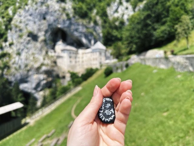 Hand-painted penguin stone #151 hidden at Predjama Castle, Predjama, Slovenia (photo 3 of 5)