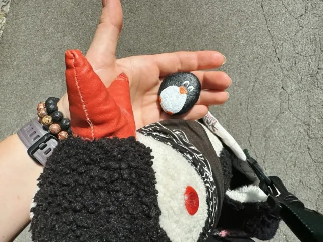 Hand-painted penguin stone #212 hidden at Trummelbach Waterfall, Lauterbrunnen, Switzerland (photo 5 of 5)