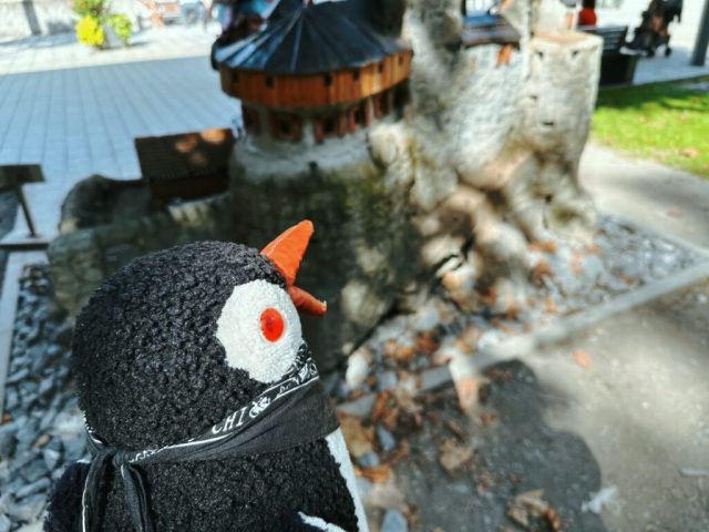 Hand-painted penguin stone #238 hidden at Castle Model, Vaduz, Liechtenstein (photo 2 of 5)