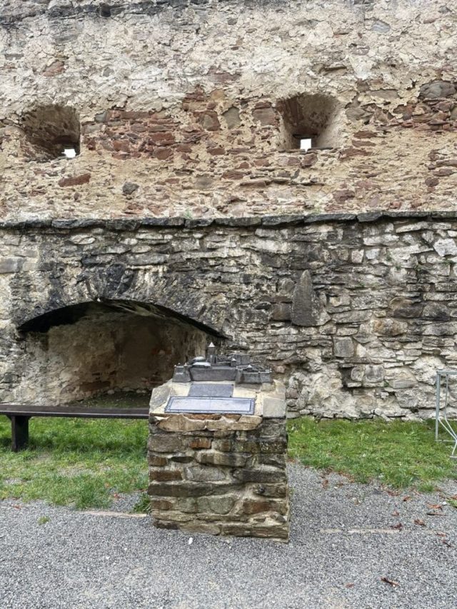 Hand-painted penguin stone #248 hidden at Castle Replica, Stara Lubovna, Slovakia (photo 2 of 5)