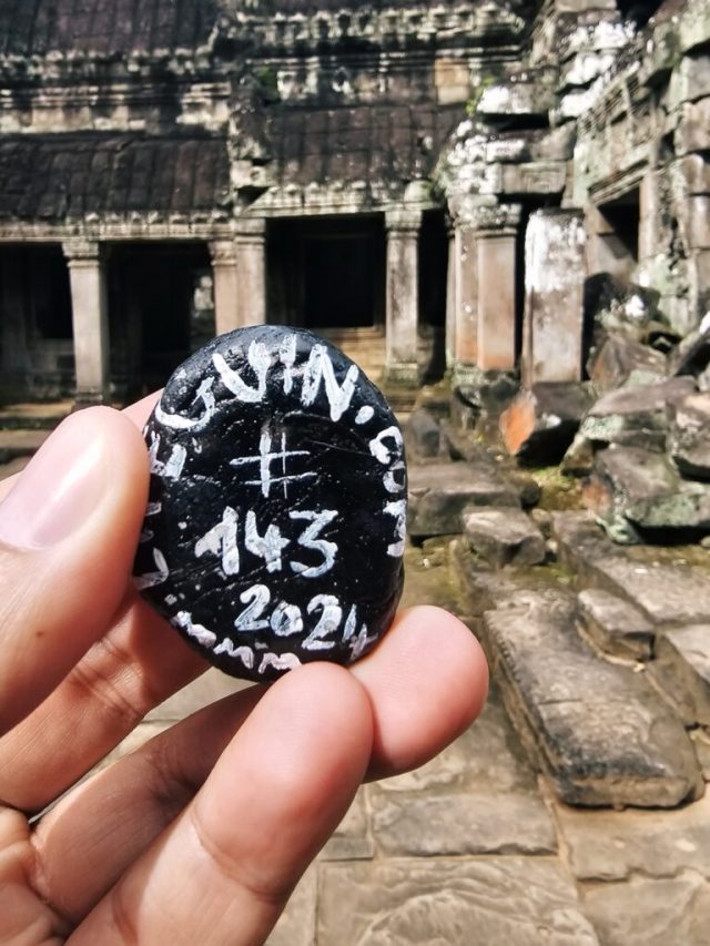 Hand-painted penguin stone #143 hidden at Ta Prohm Temple, Siem Reap, Cambodia (photo 2 of 5)