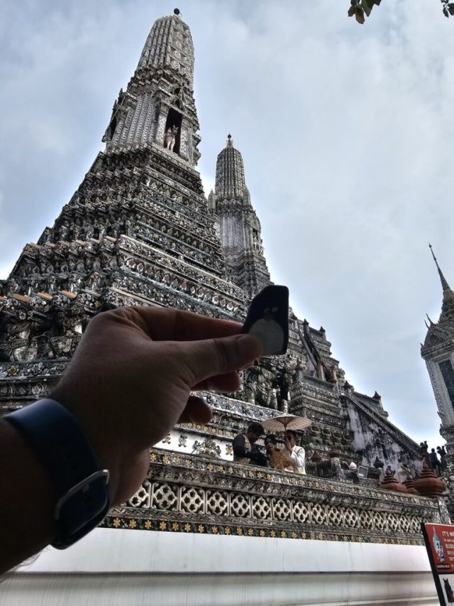 Hand-painted penguin stone #214 hidden at Wat Arun Temple, Bangkok, Thailand (photo 3 of 5)