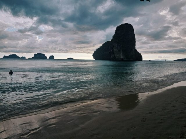 Hand-painted penguin stone #289 hidden at Railay Beach, Krabi, Thailand (photo 2 of 4)