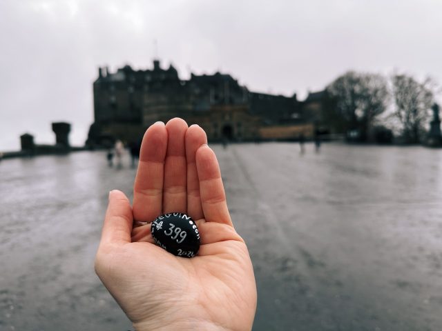 Hand-painted penguin stone #399 hidden at Castle Esplanade, Edinburgh, United Kingdom (photo 3 of 5)