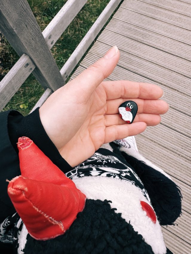 Hand-painted penguin stone #405 hidden at Urquhart Castle Docks, Loch Ness, United Kingdom (photo 3 of 5)