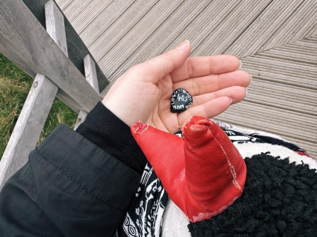 Hand-painted penguin stone #405 hidden at Urquhart Castle Docks, Loch Ness, United Kingdom (photo 4 of 5)