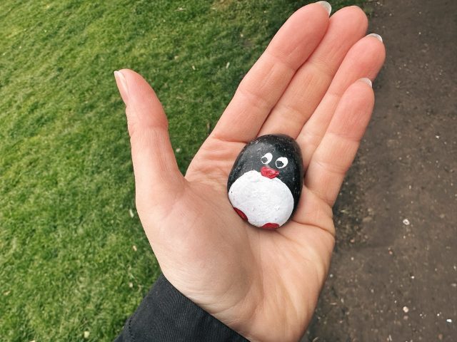 Hand-painted penguin stone #447 hidden at Edinburgh Castle, Edinburgh, United Kingdom (photo 4 of 5)