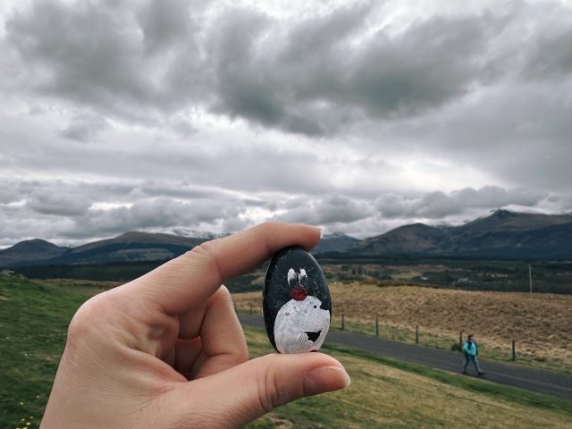 Hand-painted penguin stone #460 hidden at Ben Nevis Viewpoint, Spean Bridge, United Kingdom (photo 4 of 5)