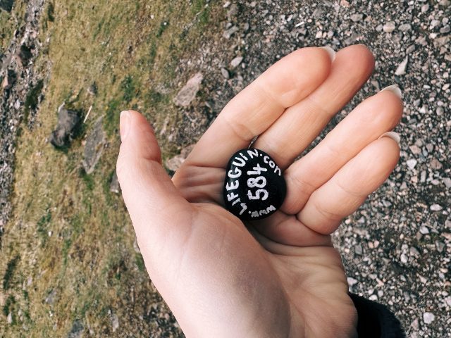 Hand-painted penguin stone #584 hidden at Three Sisters Of Glencoe, Glen Coe, United Kingdom (photo 2 of 5)