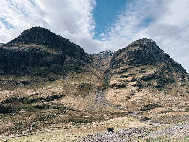 Hand-painted penguin stone #584 hidden at Three Sisters Of Glencoe, Glen Coe, United Kingdom (photo 5 of 5)