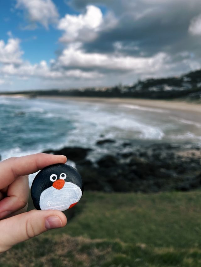 Hand-painted penguin stone #646 hidden at Tacking Point Lighthouse, Port Macquarie, Australia (photo 2 of 5)