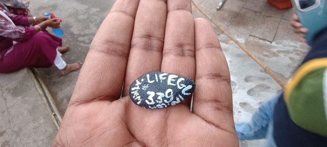 Hand-painted penguin stone #339 hidden at Rock Fort, Tiruchirapalli, India (photo 4 of 5)