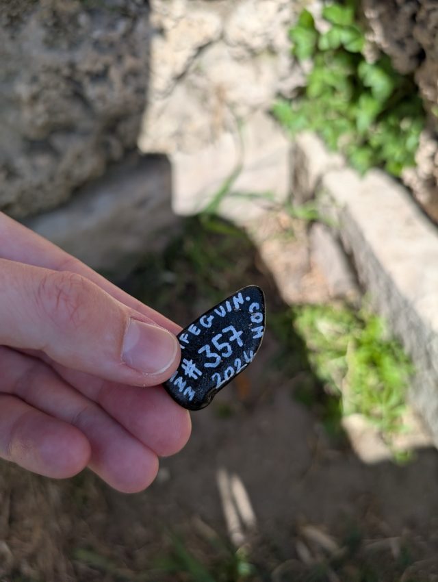 Hand-painted penguin stone #357 hidden at Parco Giochi, Trani, Italy (photo 5 of 5)