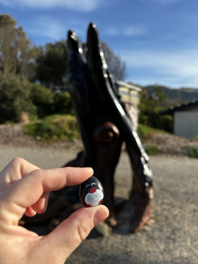Hand-painted penguin stone #583 hidden at Seals Statue, Apollo Bay, Australia (photo 4 of 5)
