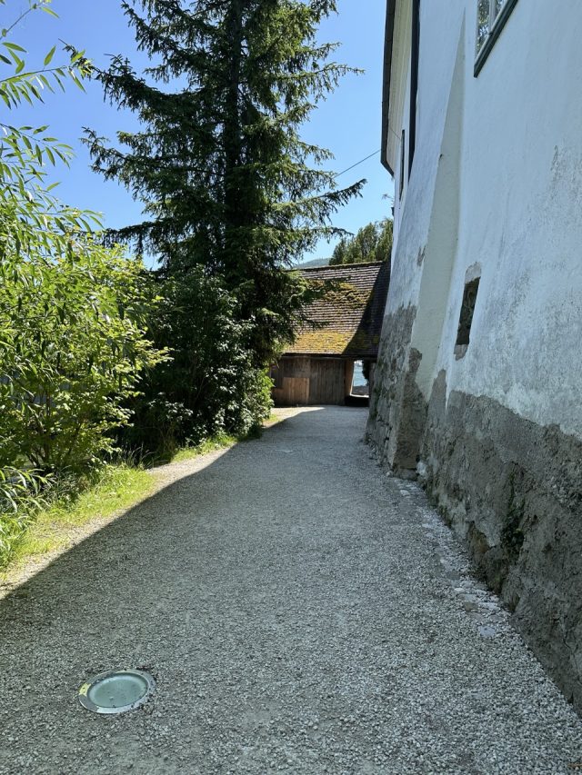 Hand-painted penguin stone #350 hidden at Schloss Ort, Gmunden, Austria (photo 2 of 5)