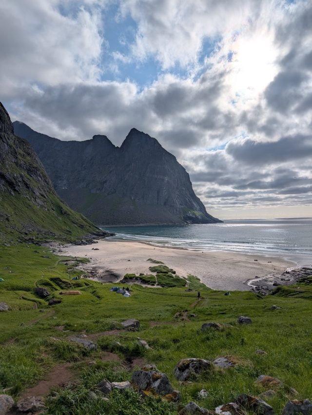 Hand-painted penguin stone #364 hidden at Kvalvika Beach, Moskenes, Norway (photo 2 of 5)
