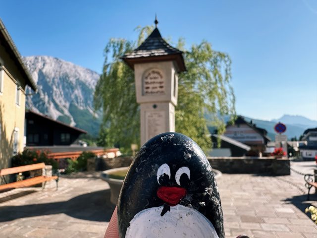 Hand-painted penguin stone #452 hidden at Memorial Fountain, Tauplitz, Austria (photo 2 of 5)