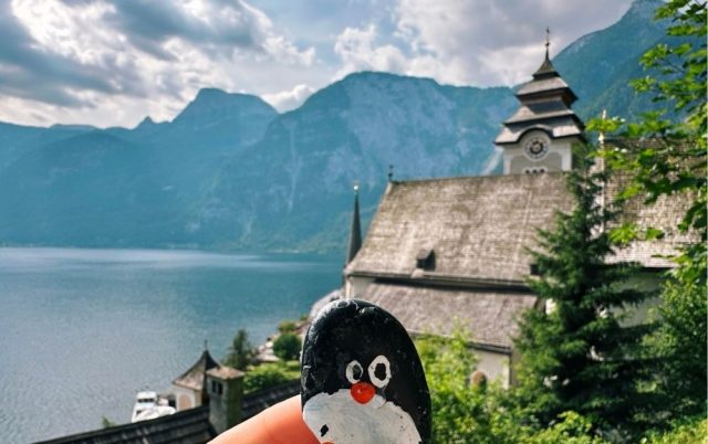 Hand-painted penguin stone #525 hidden at Wooden Shelter, Hallstatt, Austria