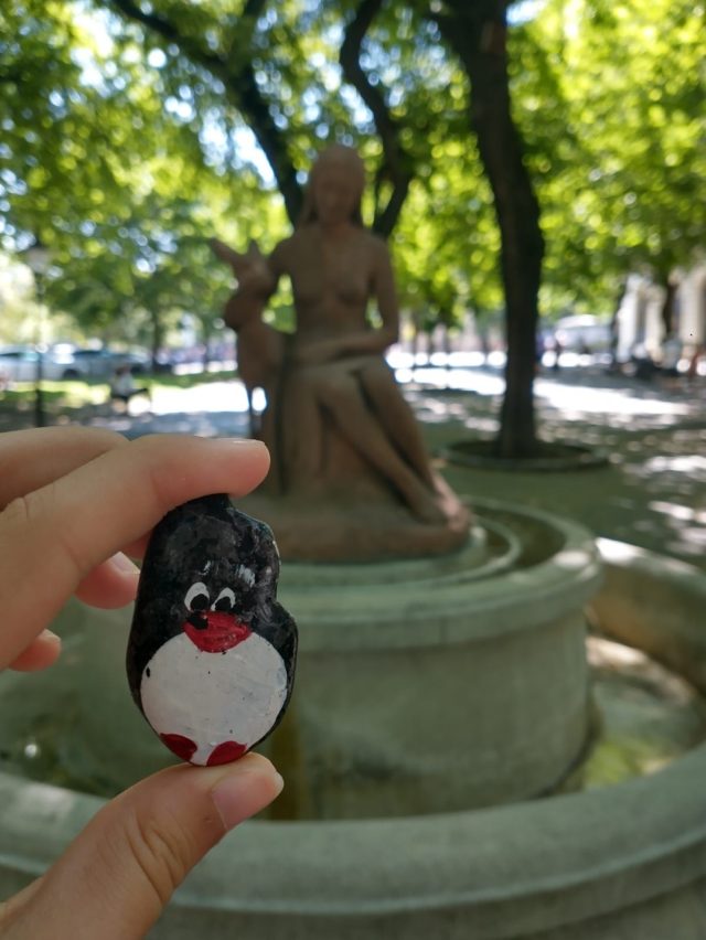 Hand-painted penguin stone #546 hidden at Girl with a Fawn, Bratislava, Slovakia (photo 2 of 5)