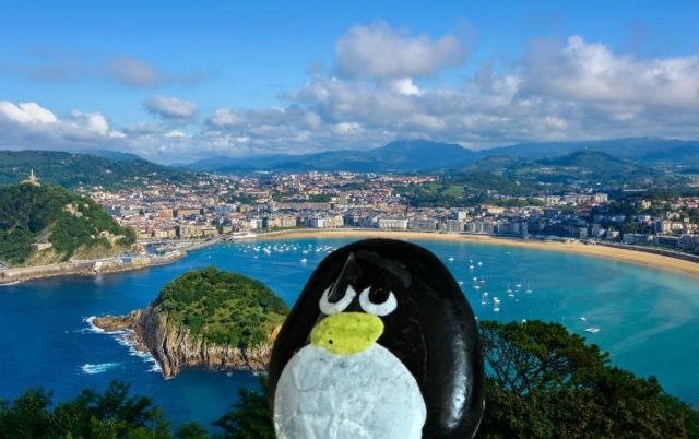 Hand-painted penguin stone #562 hidden at Mirador Club Nautico, San Sebastian, Spain