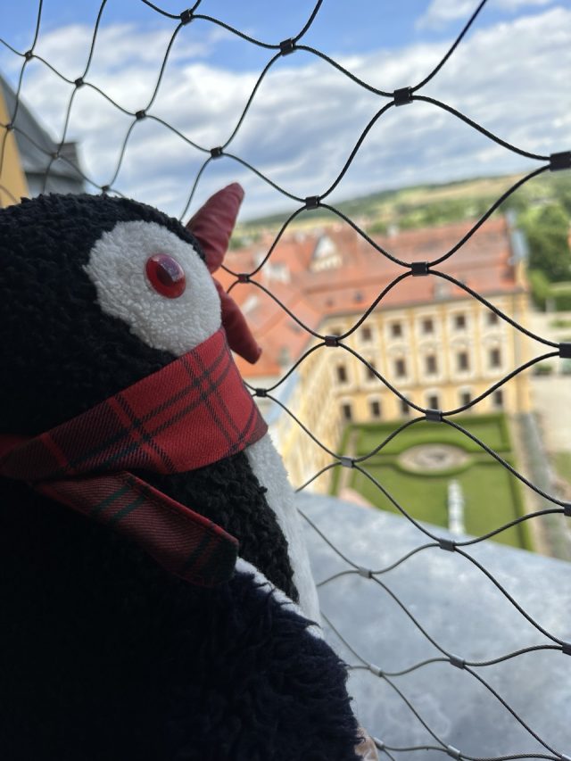 Hand-painted penguin stone #587 hidden at Church Tower, Jaromerice nad Rokytnou, Czechia (photo 2 of 5)