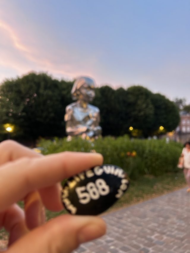 Hand-painted penguin stone #588 hidden at Lucy and the Butterflies, Mons, Belgium (photo 2 of 5)