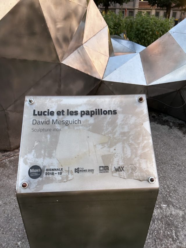 Hand-painted penguin stone #588 hidden at Lucy and the Butterflies, Mons, Belgium (photo 5 of 5)