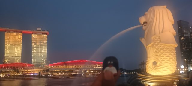 Hand-painted penguin stone #403 hidden at Merlion Park, Singapore, Singapore (photo 4 of 5)