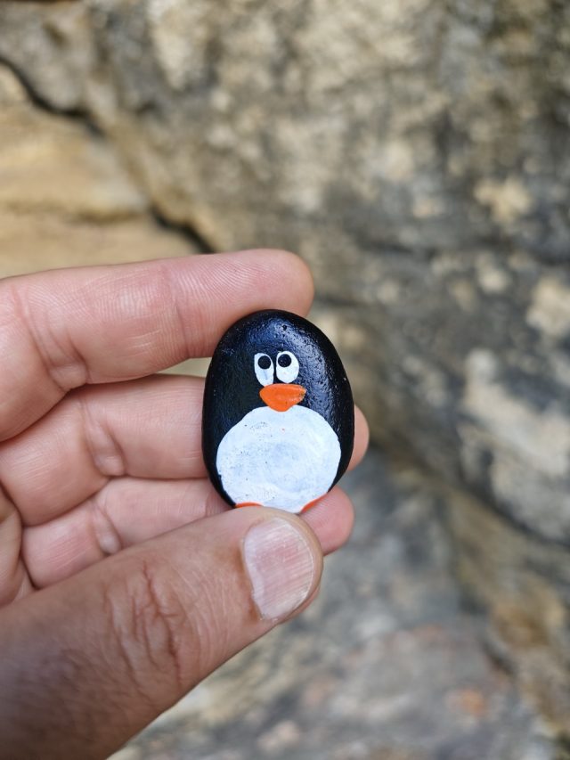 Hand-painted penguin stone #631 hidden at Lucanske Travertiny, Lucky, Slovakia (photo 4 of 5)