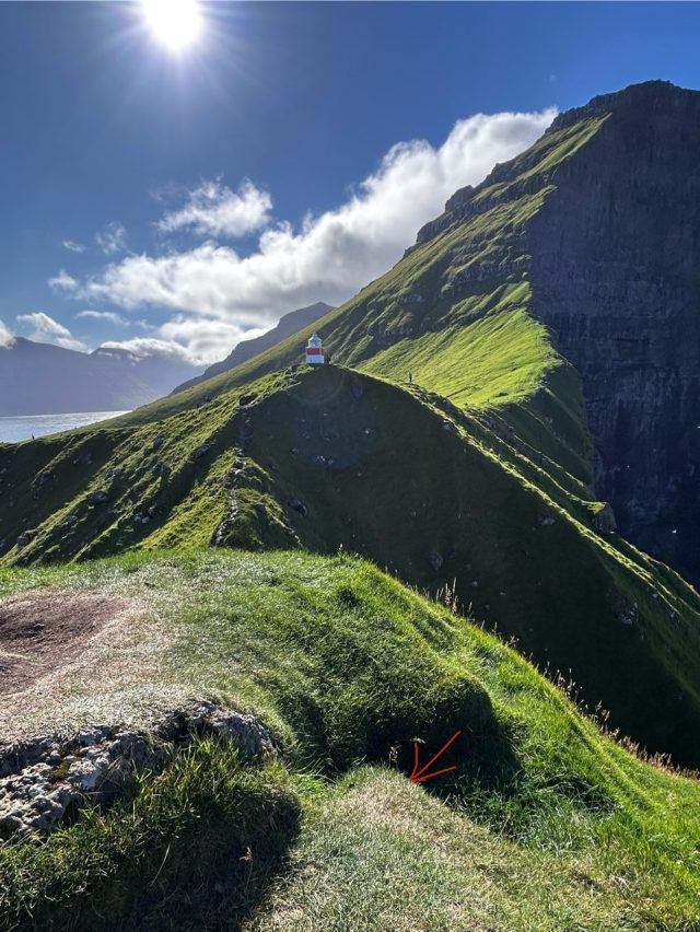 Hand-painted penguin stone #1023 hidden at Kallur Lighthouse, Kalsoy, Faroe Islands (photo 5 of 5)