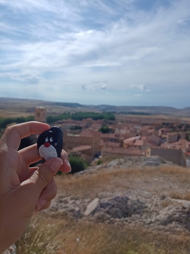 Hand-painted penguin stone #310 hidden at Castillo de Camarillas, Camarillas, Spain (photo 4 of 5)