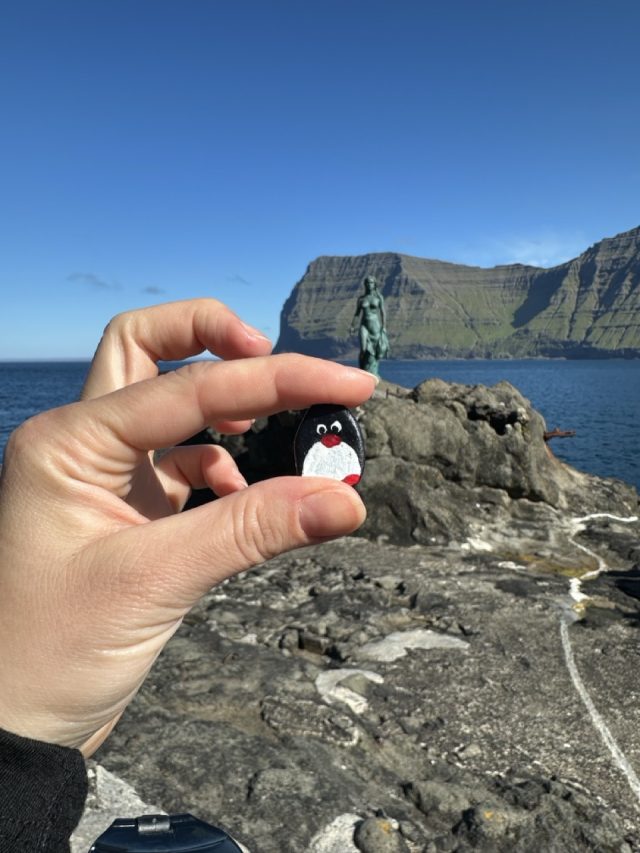 Hand-painted penguin stone #412 hidden at The Seal Woman, Mikladalur, Faroe Islands (photo 5 of 5)