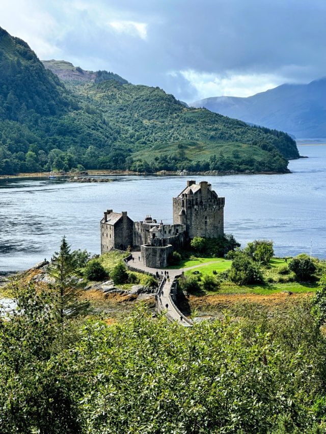 Hand-painted penguin stone #446 hidden at Eilen Donan Lookout, Dornie, United Kingdom (photo 2 of 5)