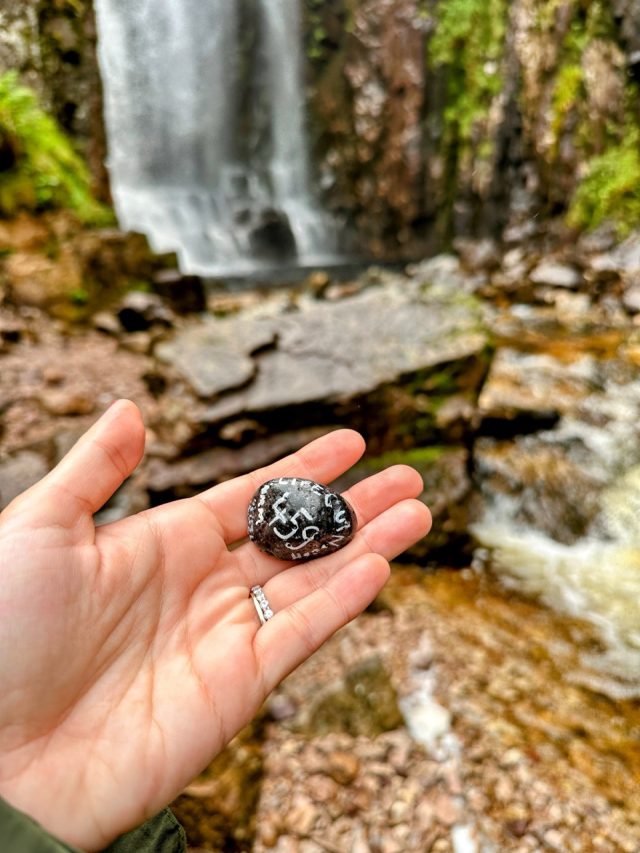 Hand-painted penguin stone #459 hidden at Allt Chranaidh Waterfall, Lairg, United Kingdom (photo 2 of 5)