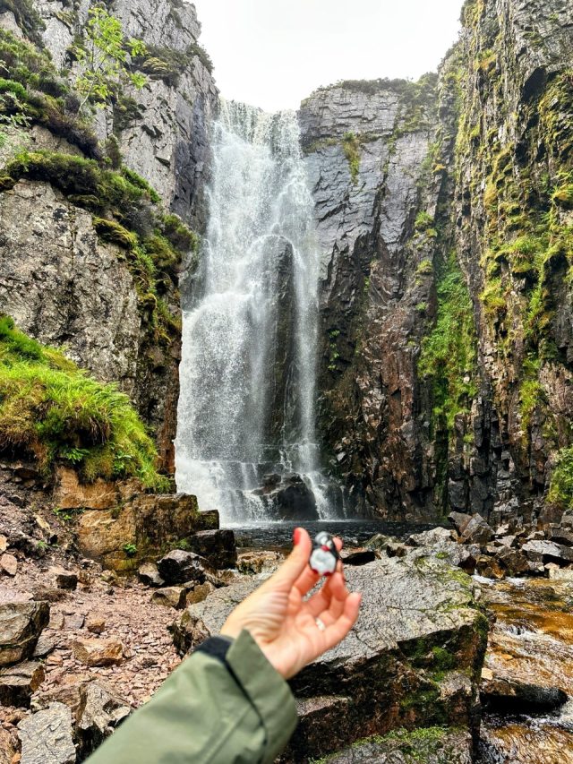 Hand-painted penguin stone #459 hidden at Allt Chranaidh Waterfall, Lairg, United Kingdom (photo 4 of 5)