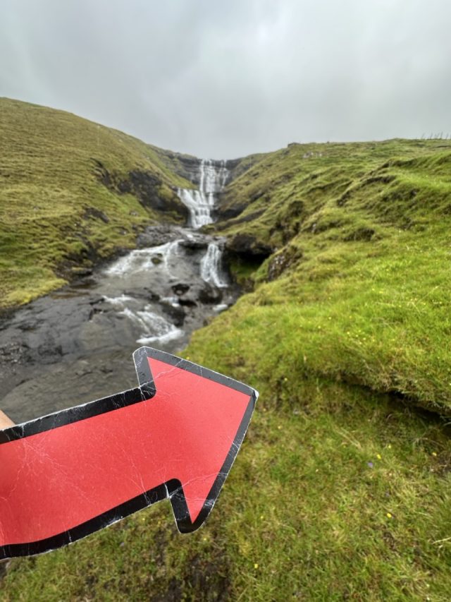 Hand-painted penguin stone #557 hidden at Waterfall, Hosvik, Faroe Islands (photo 3 of 5)