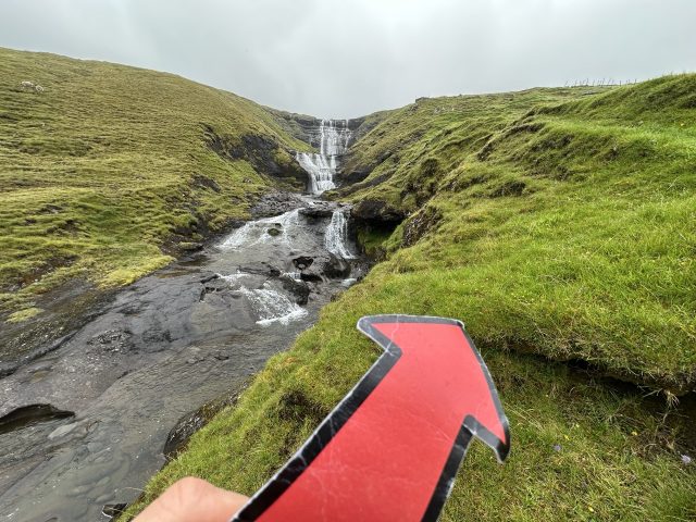 Hand-painted penguin stone #557 hidden at Waterfall, Hosvik, Faroe Islands (photo 4 of 5)