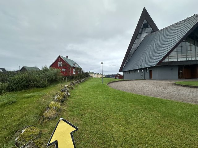 Hand-painted penguin stone #636 hidden at Vesturkirkjan, Torshavn, Faroe Islands (photo 4 of 5)