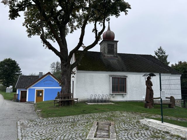 Hand-painted penguin stone #675 hidden at White Chapel, Wornharts, Austria (photo 4 of 5)